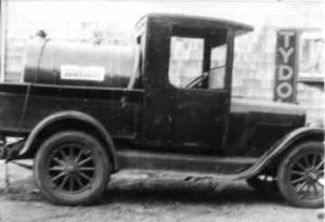 black and white image of an old truck