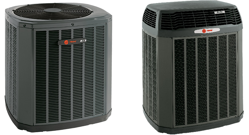 Two Trane black air conditioning units